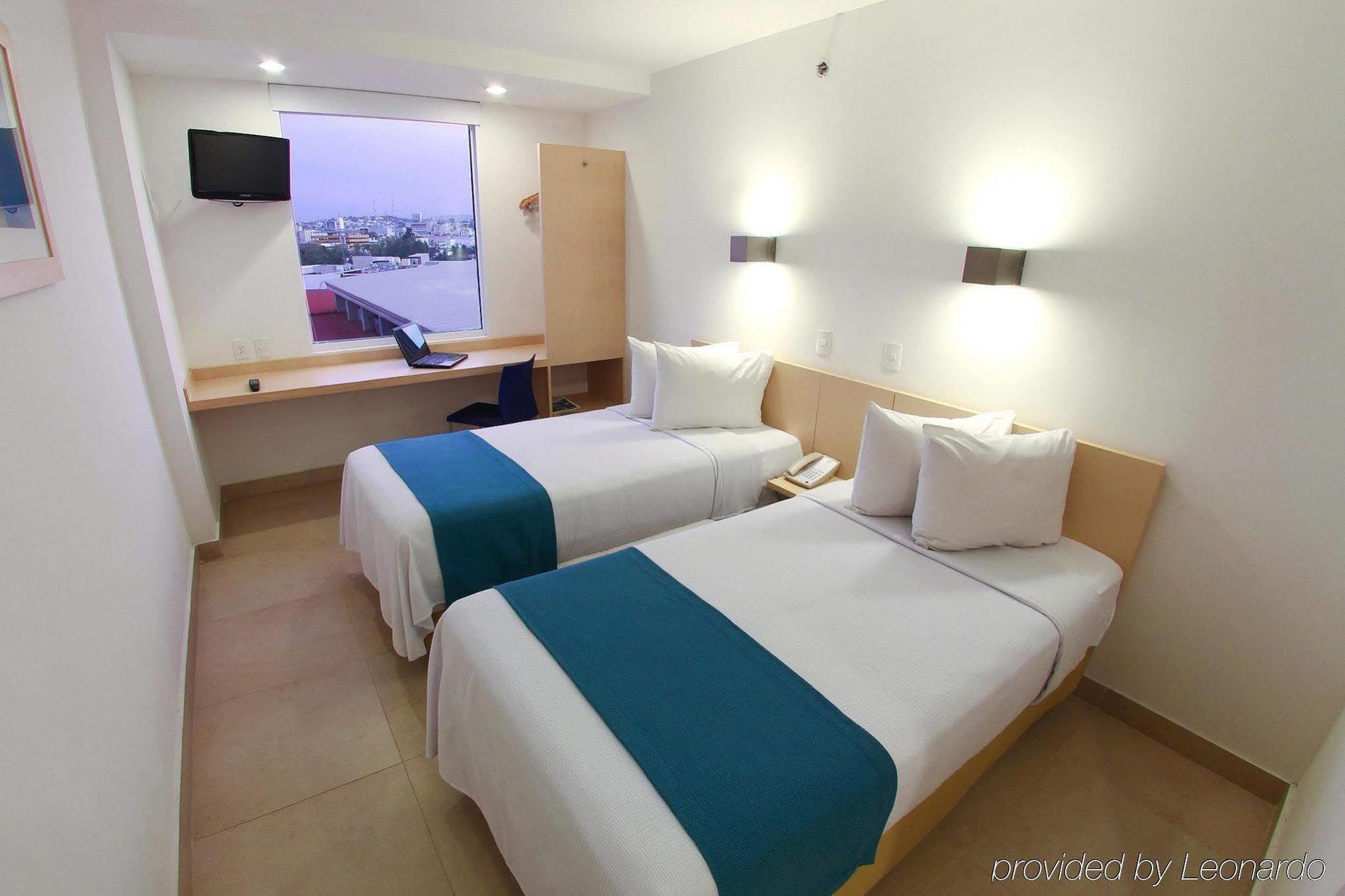 One Culiacan Forum Room photo